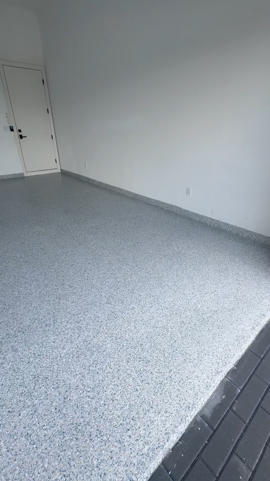 Tidal Wave flake garage floor installed by Seal Tech Epoxy in Boca Raton
