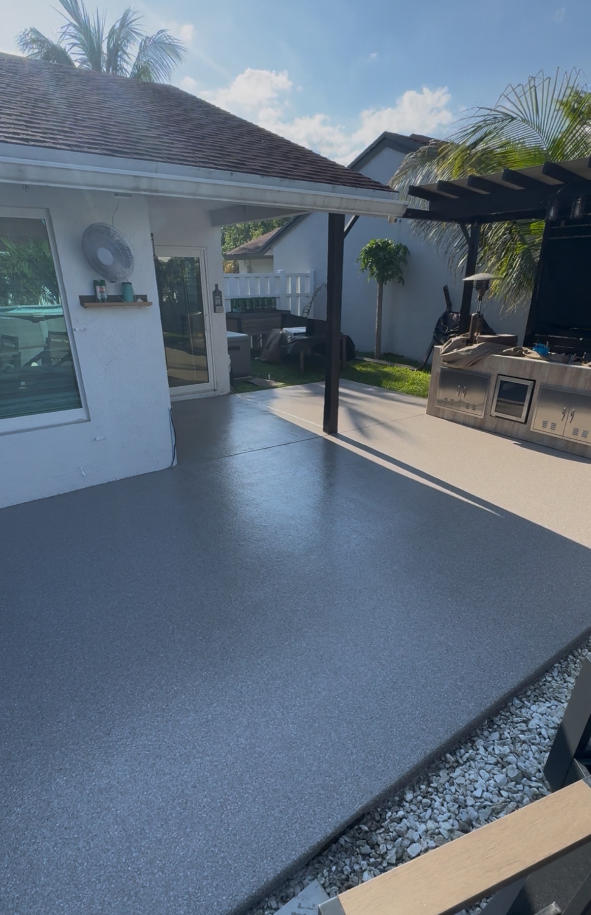 Finished gray outdoor patio coating by Seal Tech Epoxy
